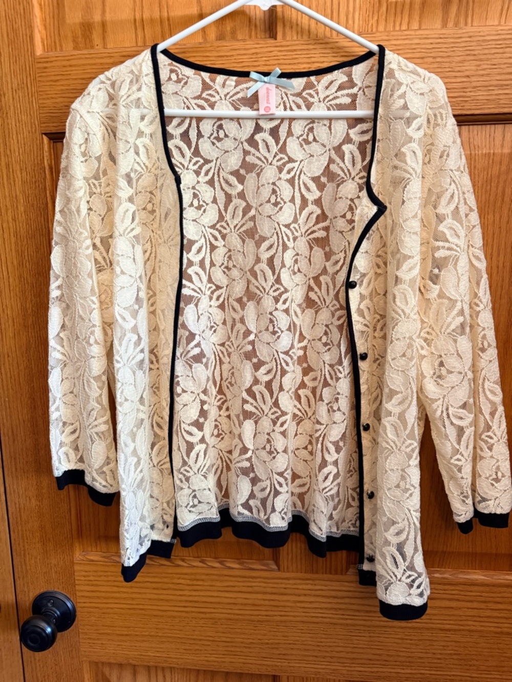 DownEast Cream Lace Top with Black Trim and Blue Bow